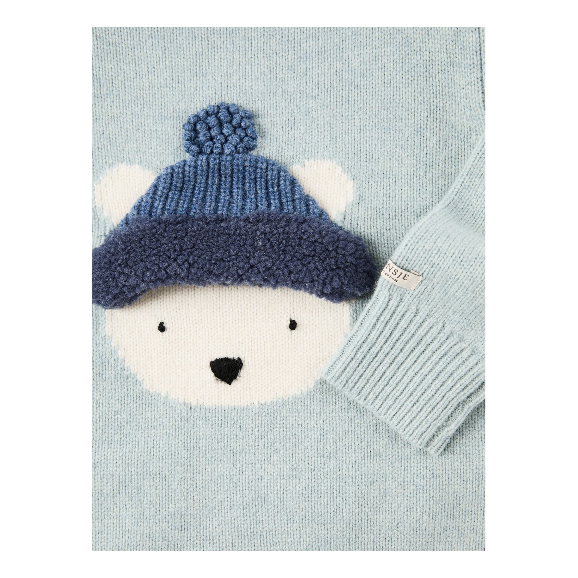 Donsje Strickpullover 'Polar Bear' aus Merinowolle Hellblau, Frontansicht – UNGER.DE