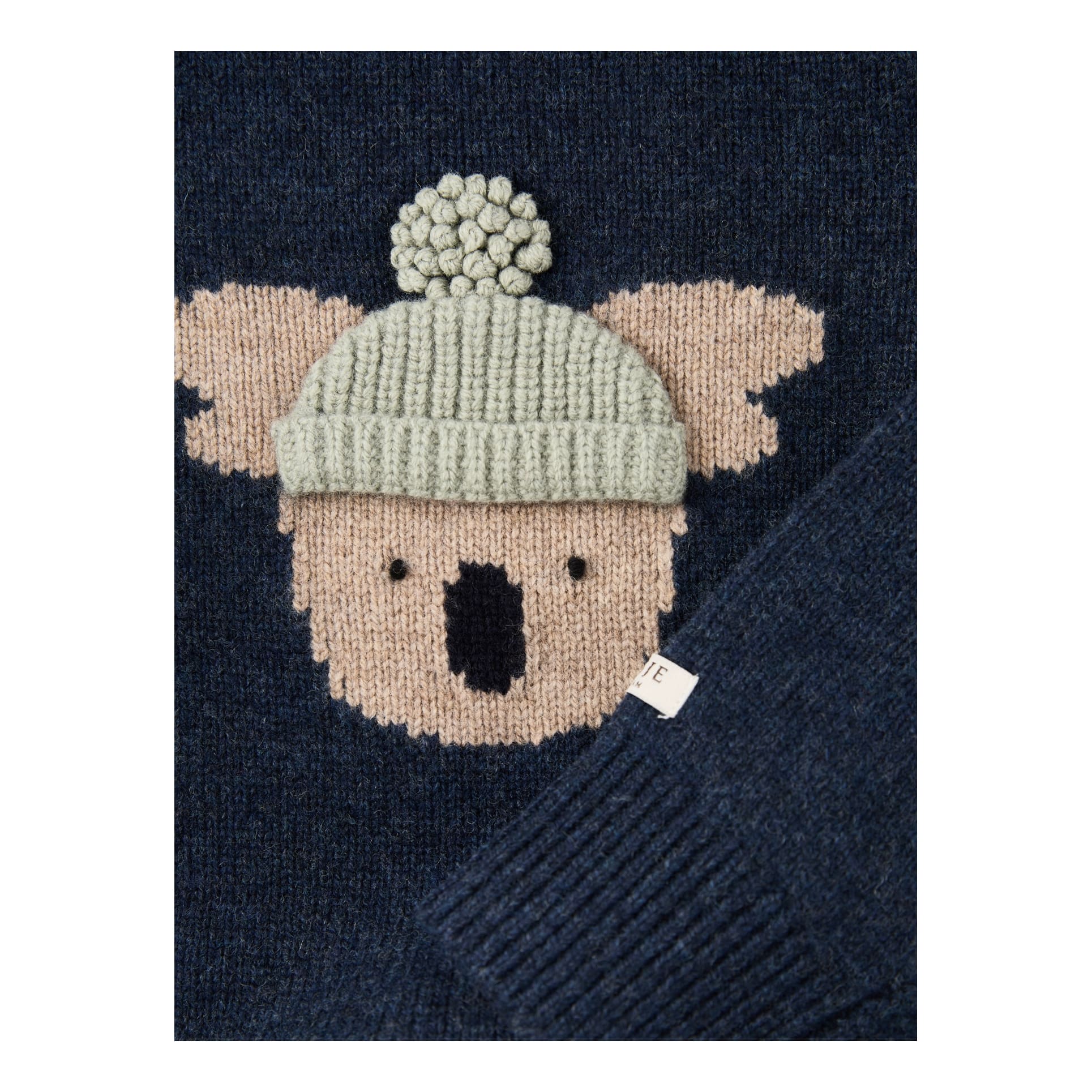Donsje Strickpullover 'Koala' aus Merinowolle Marineblau, Frontansicht – UNGER.DE